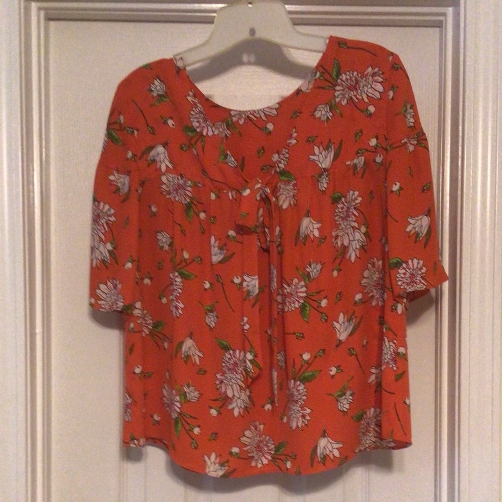 Floral pull over top